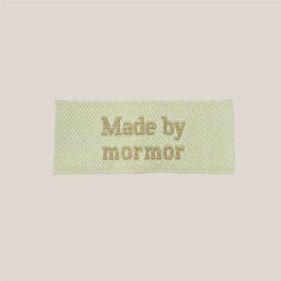 "Made by..." label